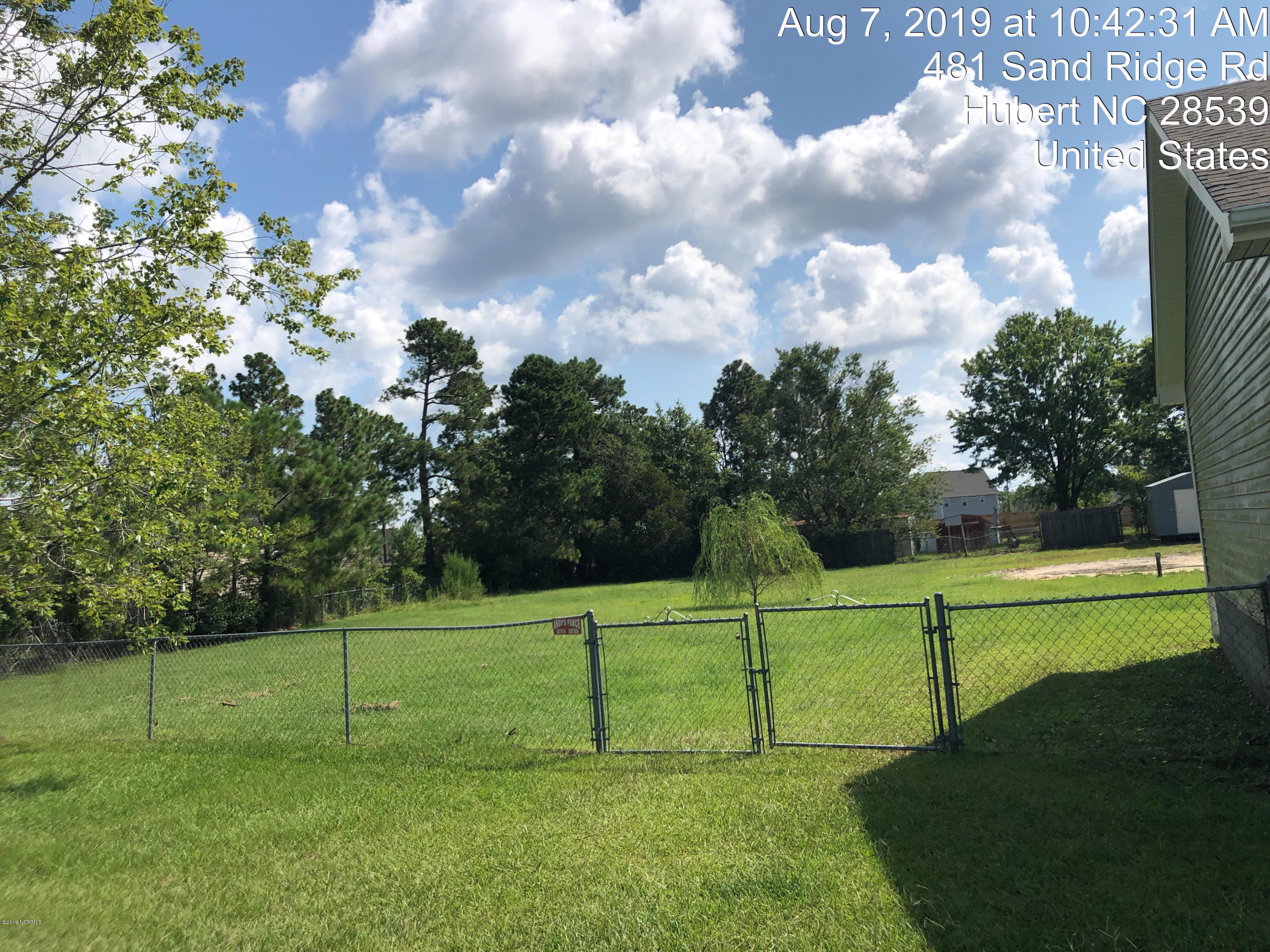 481 Sand Ridge Road Hubert, NC 28539 - Photo 13 of 14 08-07-2019 lawn 4