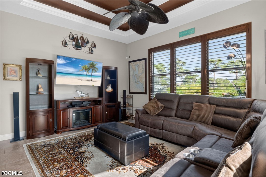 6109 Calusa Rdg Trail Bokeelia, FL 33922 - Photo 23 of 48 a living room with furniture and a flat screen tv