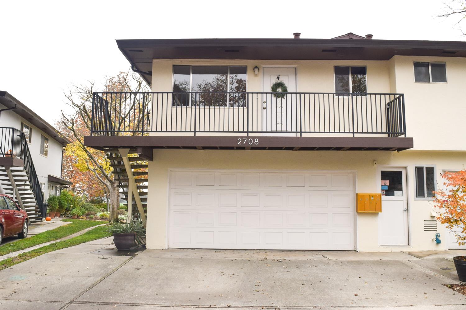 2708 Pole Line Road, Unit 4 Davis, CA 95618 - Photo 2 of 10 a view of a brick house with many windows