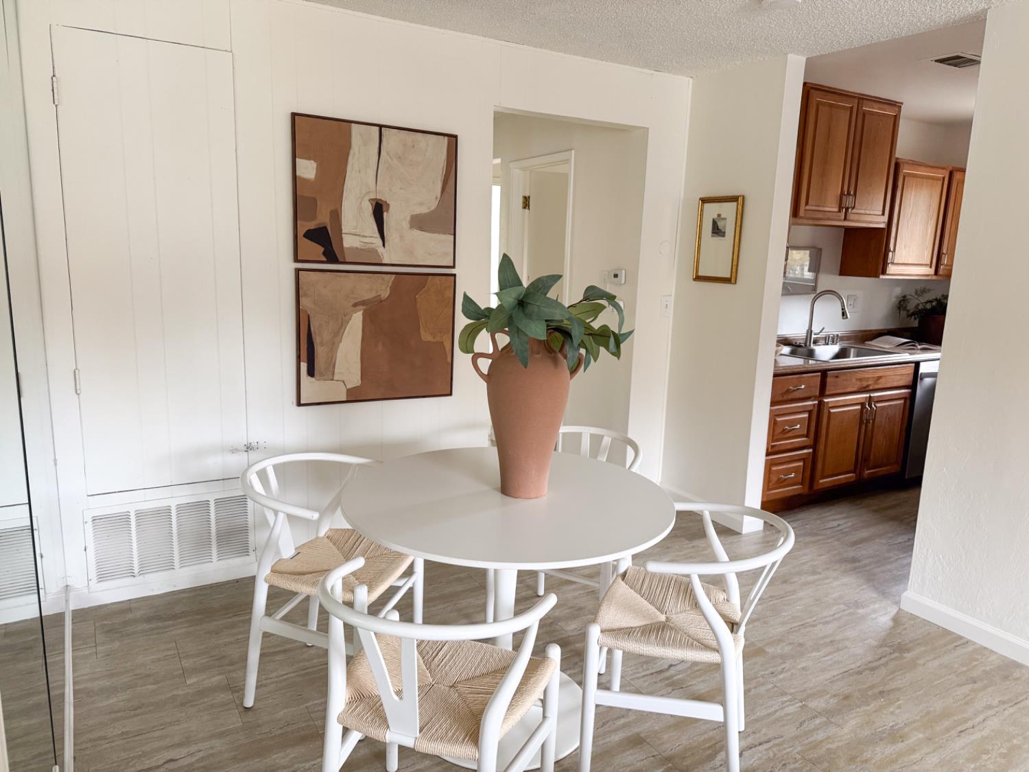 2708 Pole Line Road, Unit 4 Davis, CA 95618 - Photo 6 of 10 a dining room with stainless steel appliances granite countertop a dining table and chairs