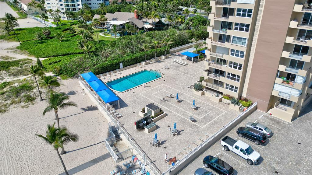 2000 South Ocean Boulevard, Unit 2L Lauderdale-by-the-Sea, FL 33062 - Photo 38 of 41 an aerial view of a house with a swimming pool