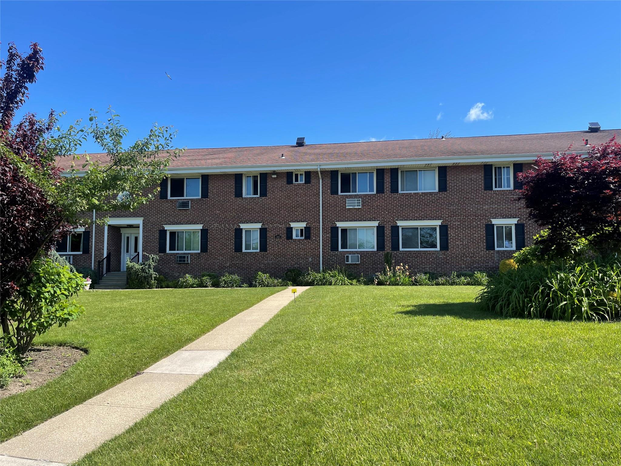 200 Merrick Road, Unit Q Amityville, NY 11701 - Photo 1 of 1 View of building exterior