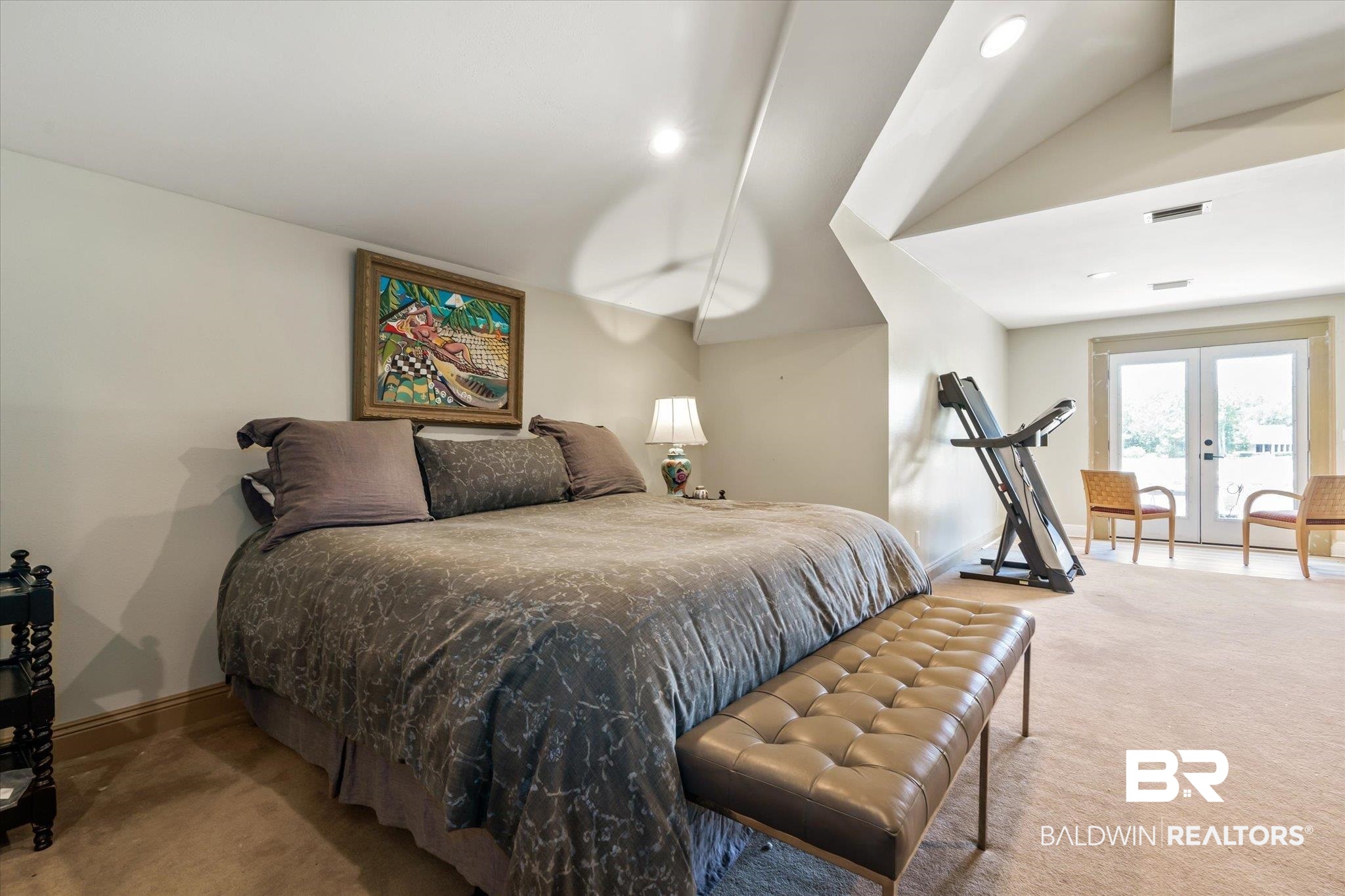 6341 Raintree Road Fairhope, AL 36532 - Photo 20 of 40 Carpeted bedroom featuring vaulted ceiling and french doors
