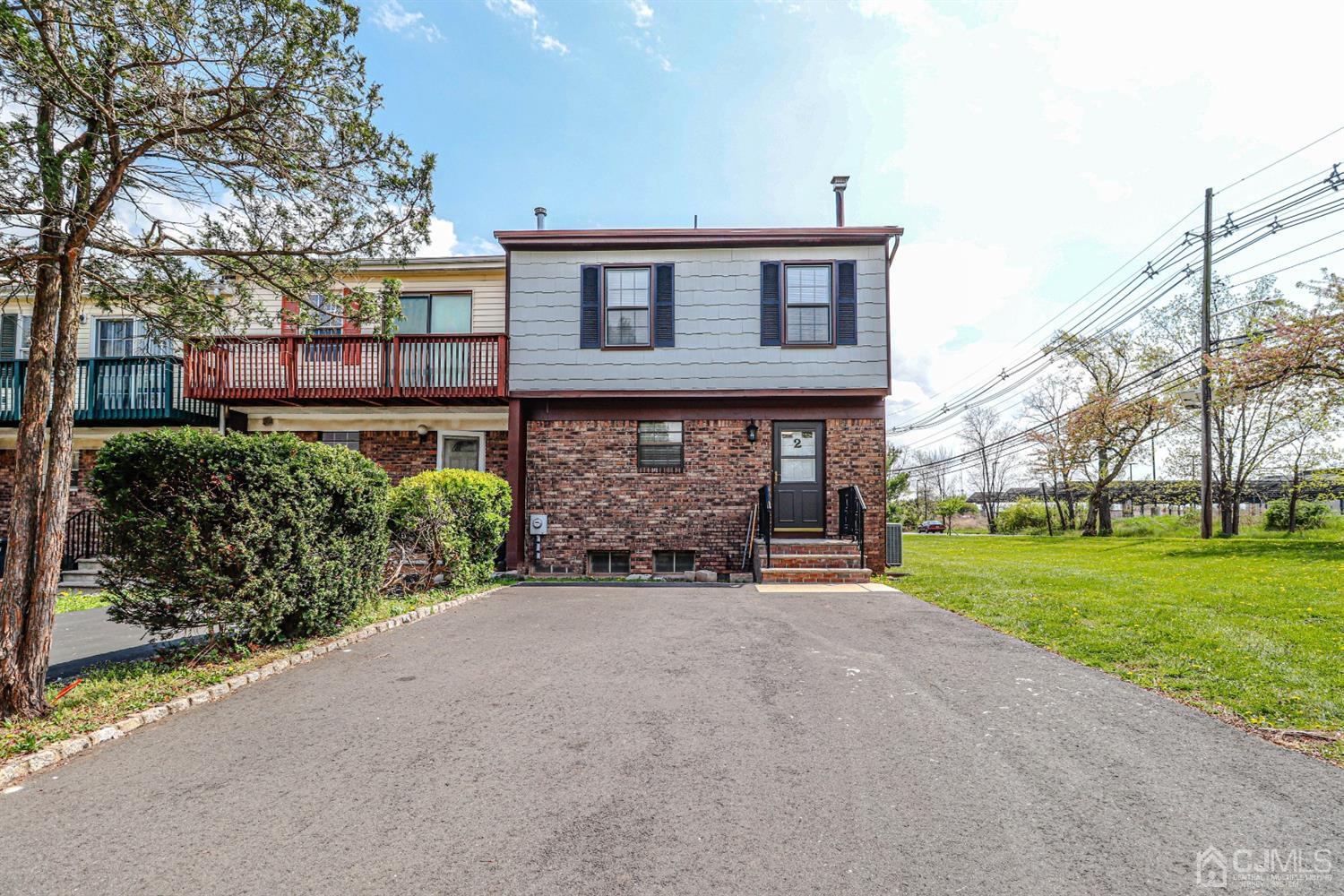 2 Redbud Road Piscataway, NJ 08854 - Photo 1 of 38 front view of a house with a yard