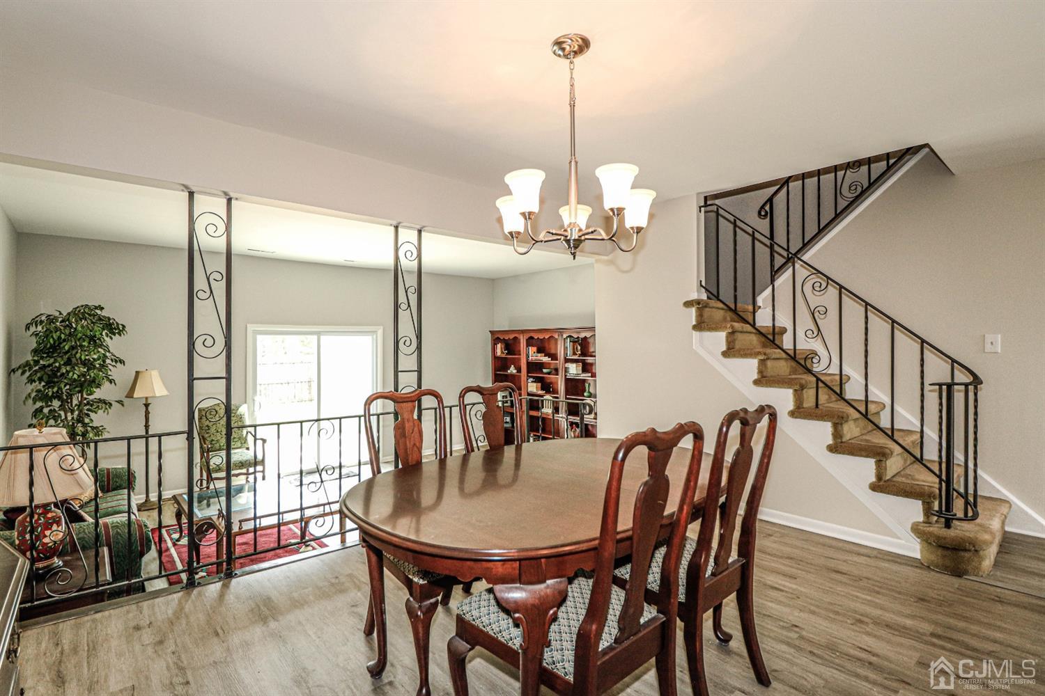 2 Redbud Road Piscataway, NJ 08854 - Photo 14 of 38 a view of a dining room with furniture and wooden floor