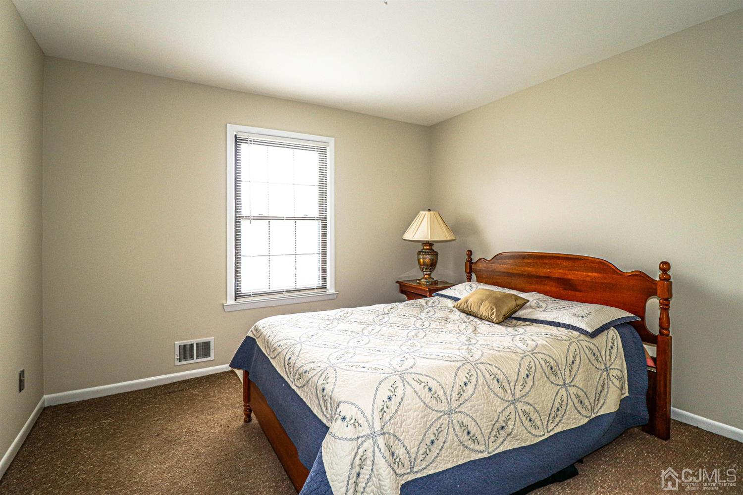 2 Redbud Road Piscataway, NJ 08854 - Photo 31 of 38 a bedroom with a bed and a window
