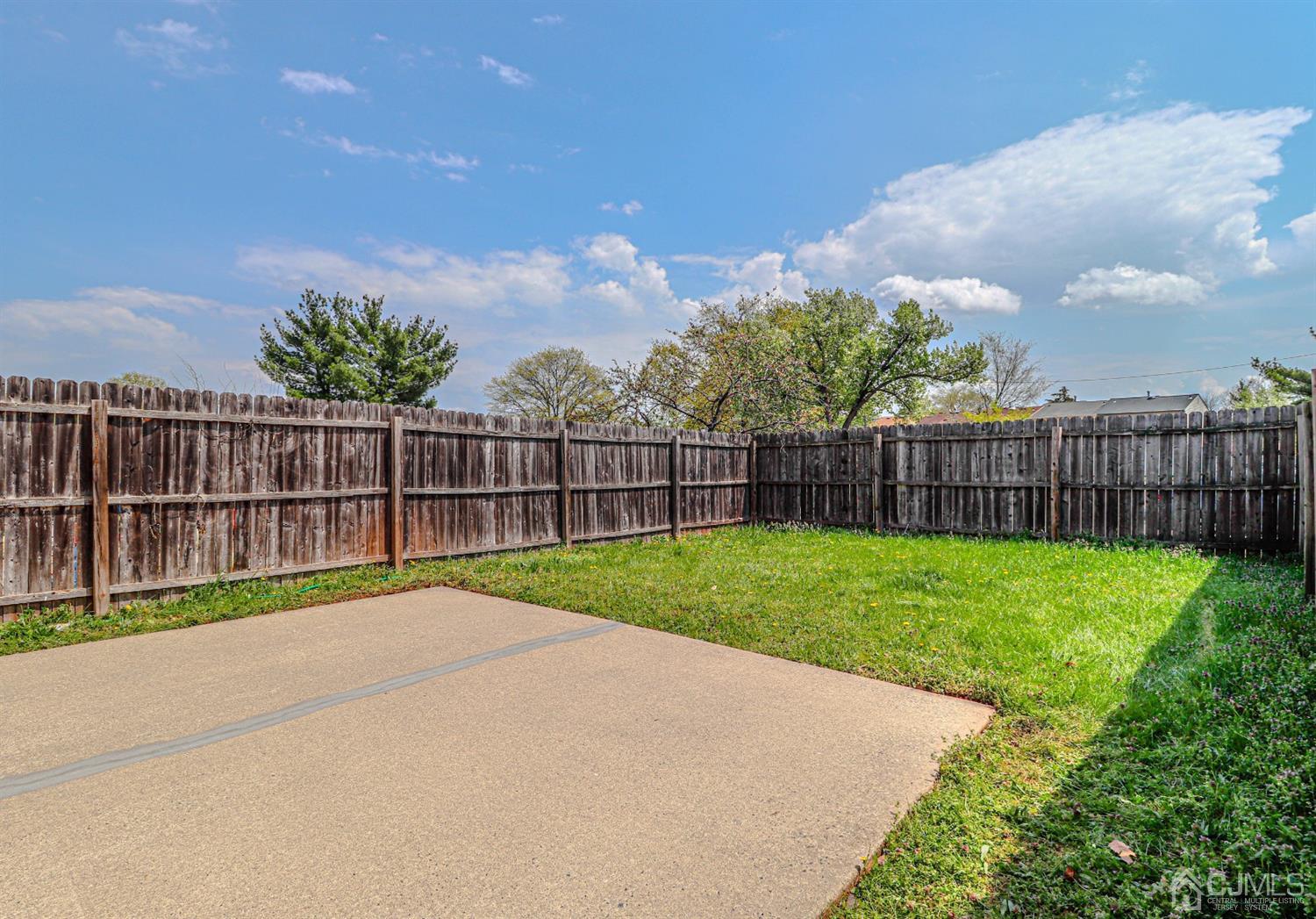 2 Redbud Road Piscataway, NJ 08854 - Photo 36 of 38 a view of backyard with wooden fence
