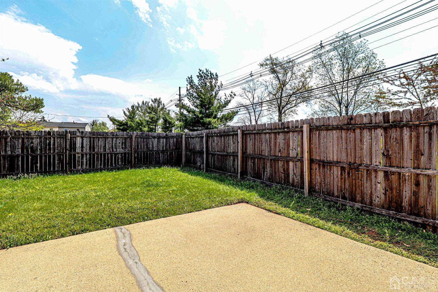 2 Redbud Road Piscataway, NJ 08854 - Photo 38 of 38 a view of a backyard with wooden fence