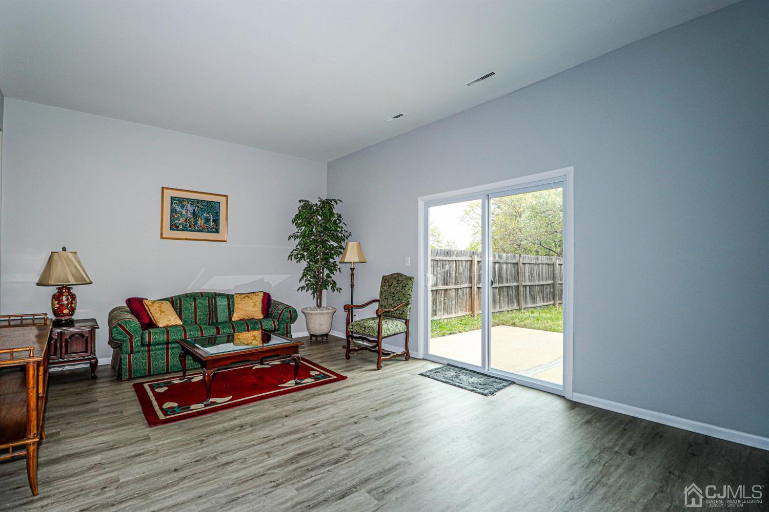2 Redbud Road Piscataway, NJ 08854 - Photo 7 of 38 a living room with furniture window and a wooden floor