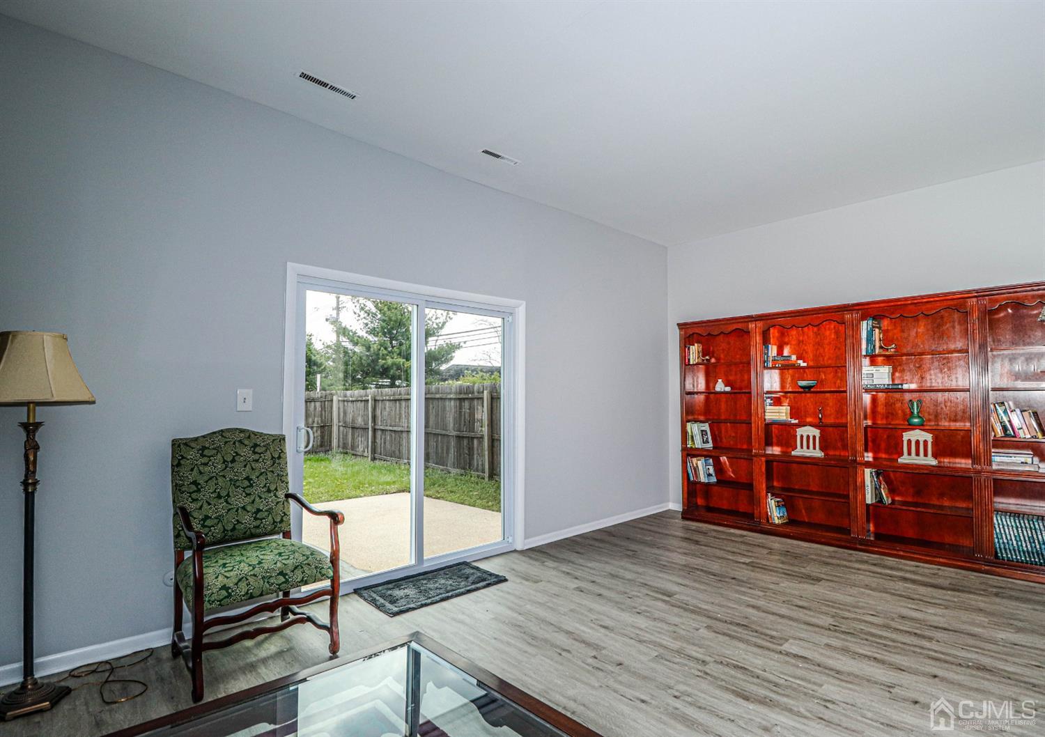 2 Redbud Road Piscataway, NJ 08854 - Photo 10 of 38 a living room with furniture and a floor to ceiling window
