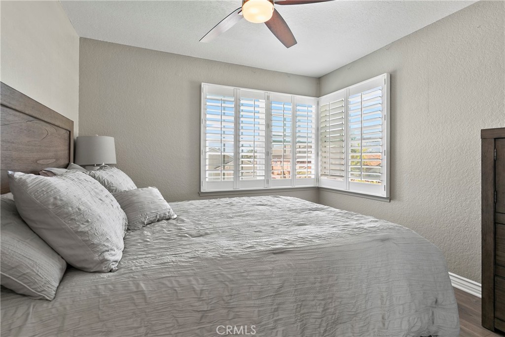 404 Calle Macho San Clemente, CA 92673 - Photo 11 of 19 a large bed sitting in a bedroom next to a window