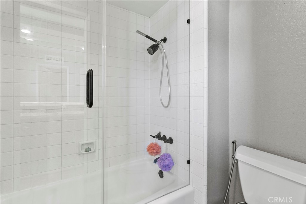 404 Calle Macho San Clemente, CA 92673 - Photo 14 of 19 a bathroom with a shower and a toilet