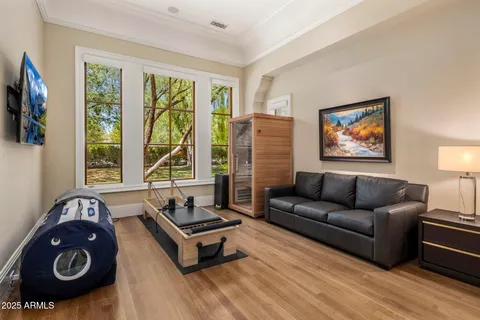 a living room with furniture and a window