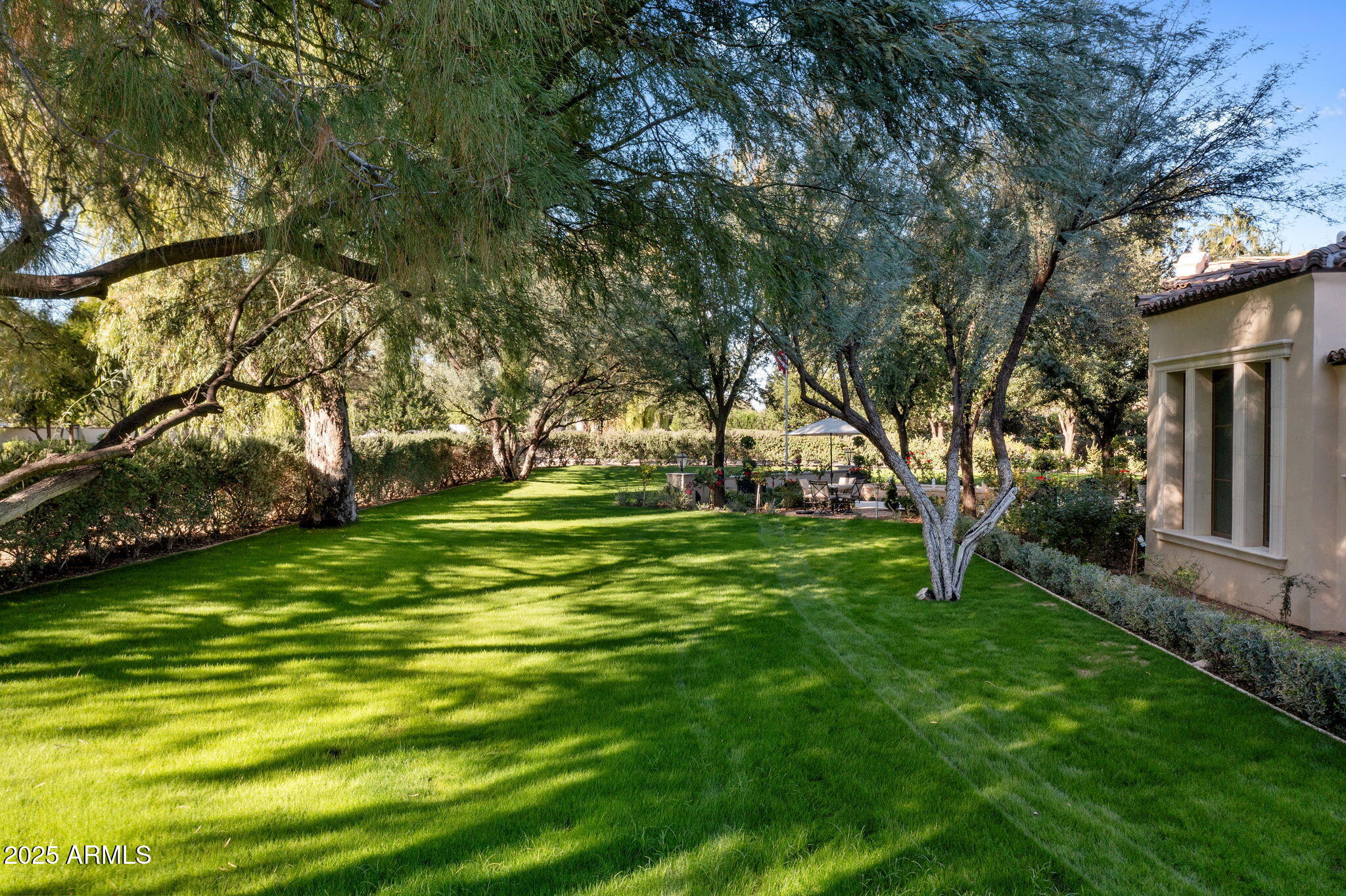 8345 Morning Glory Road Paradise Valley, AZ 85253 - Photo 8 of 37 a garden view with a fountain