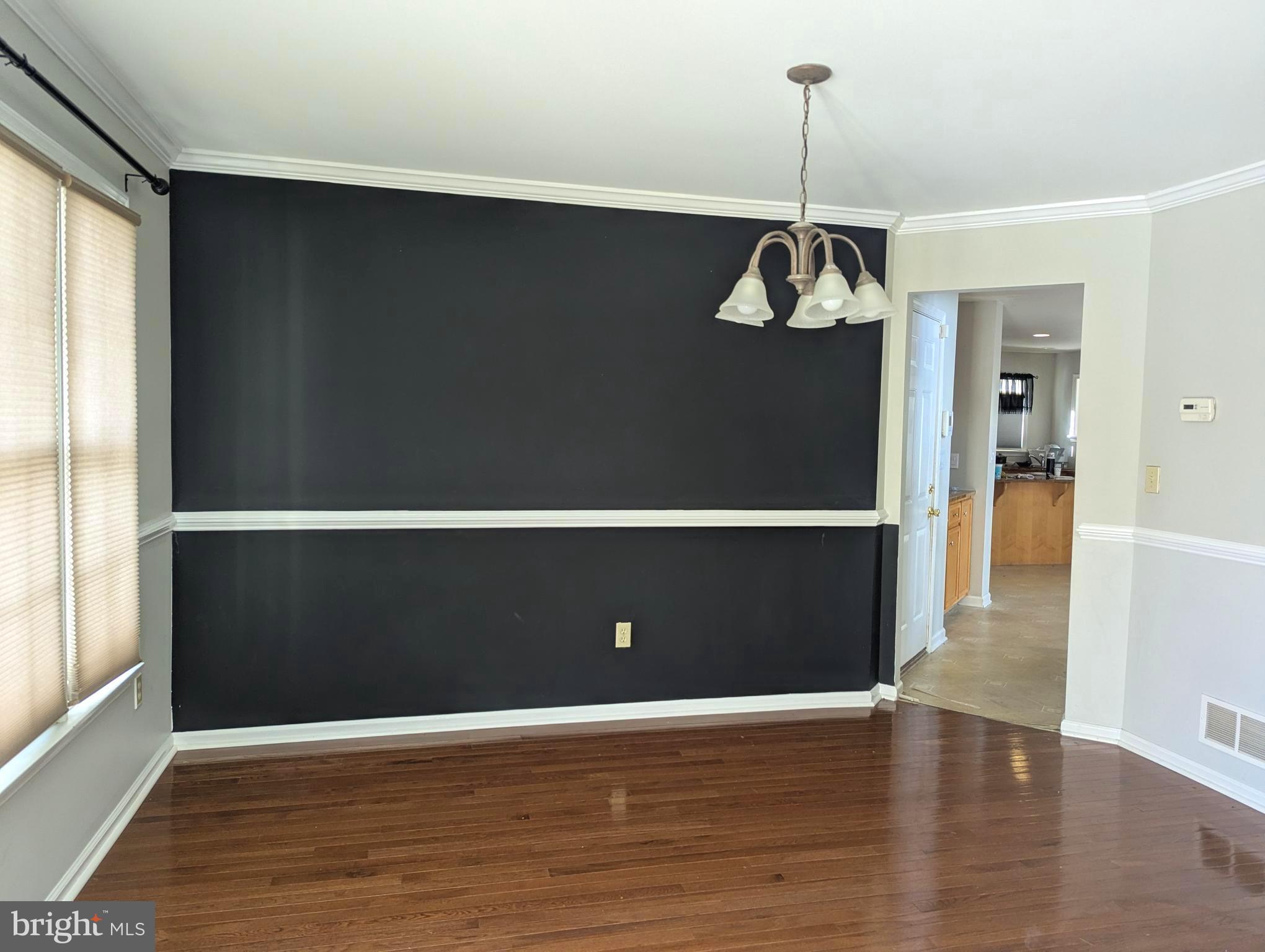 64 Mill Brook Court Easton, PA 18045 - Photo 4 of 4 a view of an empty room with wooden floor and windows
