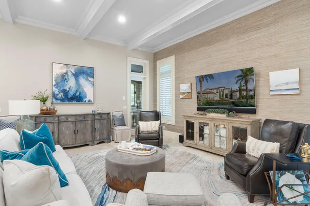 a view of walk in closet with clothes