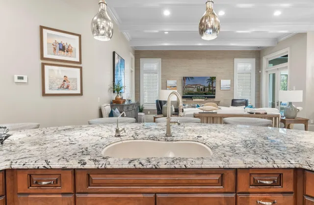 a view of walk in closet with clothes