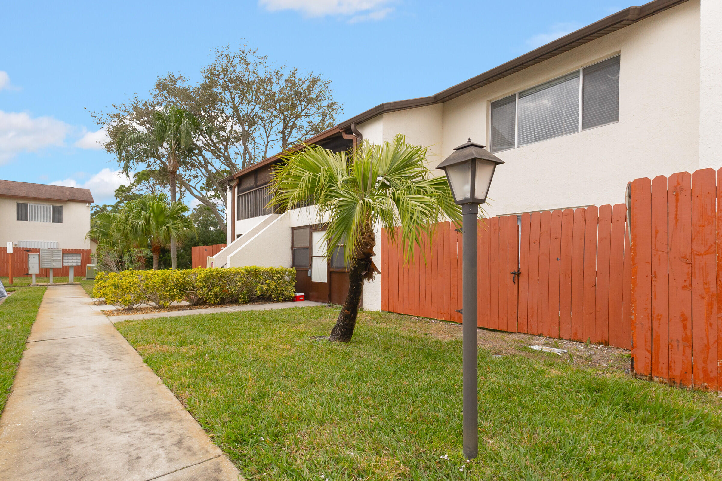 720 Ridge Club Drive, Unit 43 Melbourne, FL 32934 - Photo 8 of 27 Side View Looking West