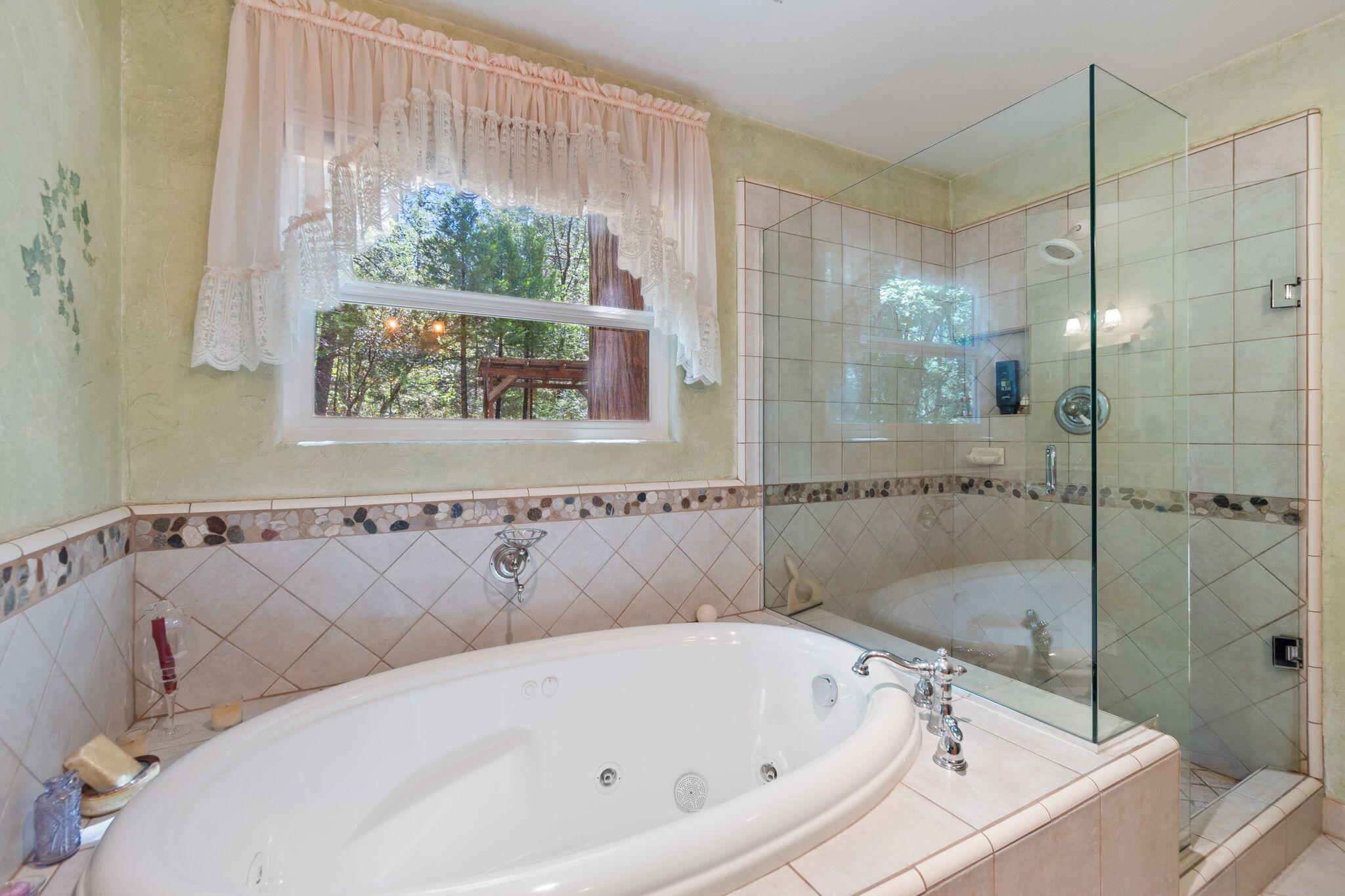 30303 Oak Run To Fern Road Whitmore, CA 96096 - Photo 28 of 75 a bathroom with a bathtub and shower