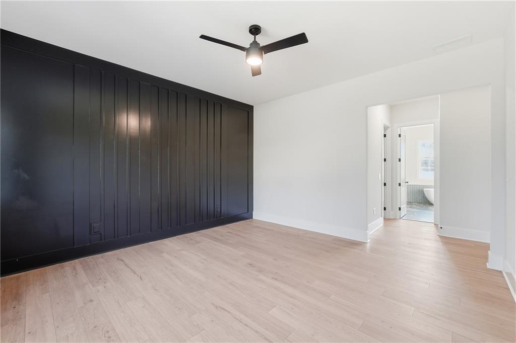 157 Palisade Drive Rydal, GA 30171 - Photo 28 of 68 a view of a room with a ceiling fan and wooden floor