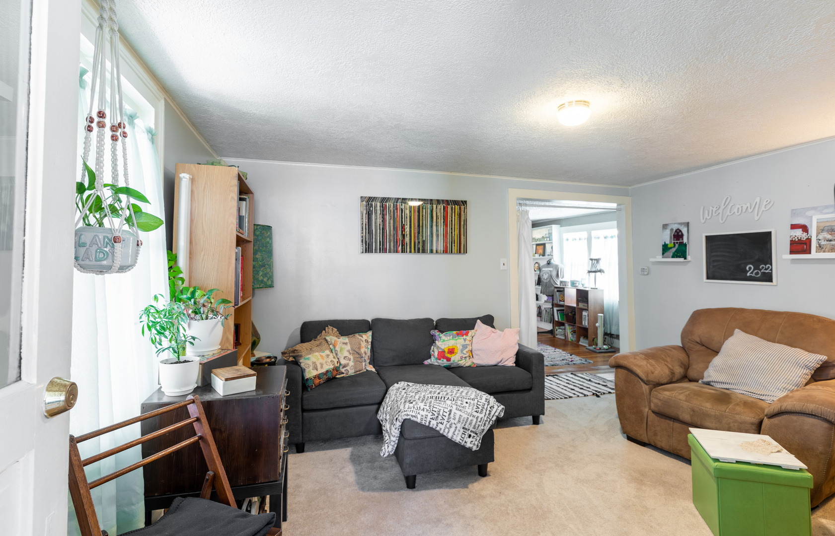 916 North 8th Street Rochelle, IL 61068 - Photo 6 of 16 a living room with furniture and a potted plant