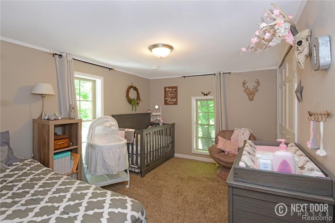 1426 Faussett Road Howell, MI 48855 - Photo 16 of 28 Upper floor bedroom 2 (closet has organizers)