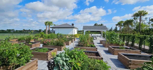 a outdoor space with lots of white furniture