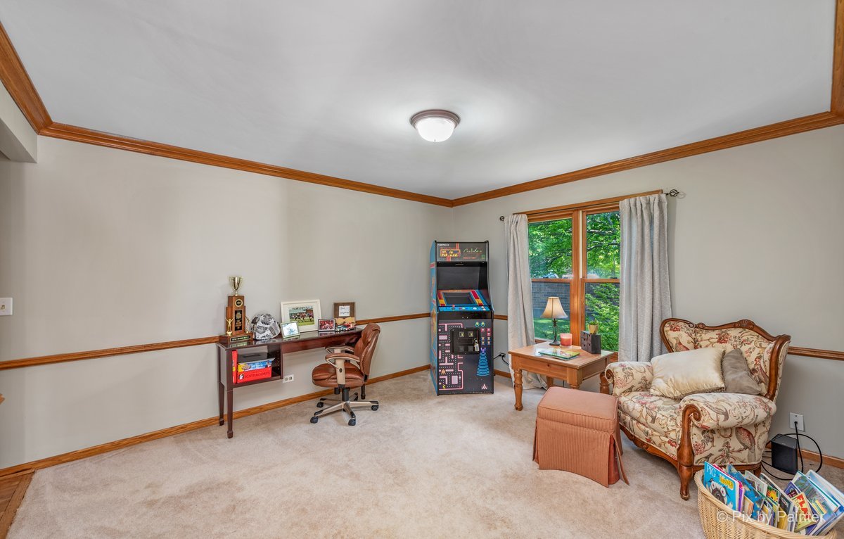 120 Briargate Road Cary, IL 60013 - Photo 15 of 35 a livingroom with workspace and a window