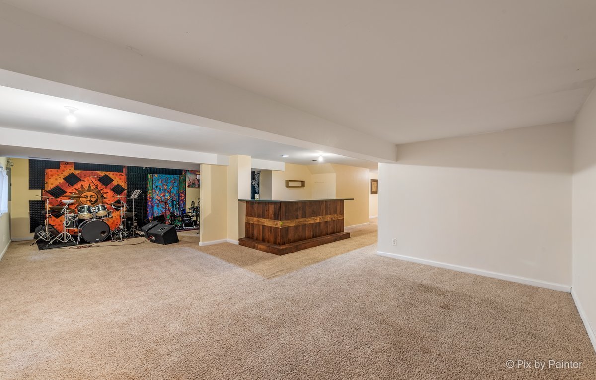 120 Briargate Road Cary, IL 60013 - Photo 26 of 35 an empty room with furniture and a ceiling fan