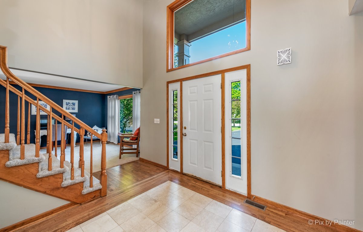 120 Briargate Road Cary, IL 60013 - Photo 3 of 35 a view of an entryway with staircase