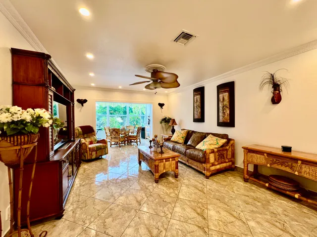 a bathroom with a shower sink and mirror