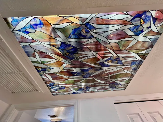 a view of house with a yard