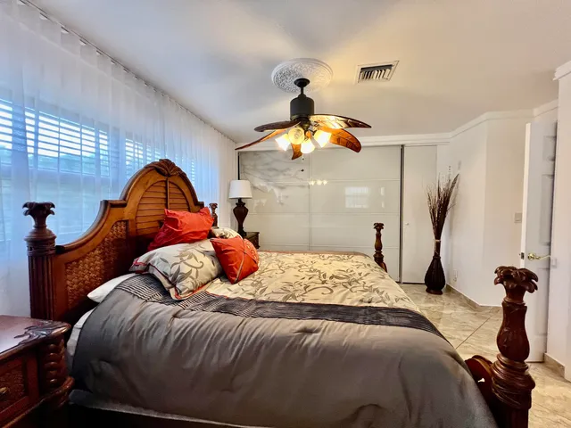 a kitchen with stainless steel appliances granite countertop a stove sink and cabinets