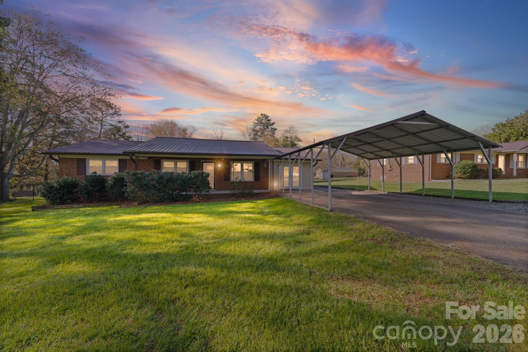 3227 Westover Road Statesville, NC 28677 - Photo 1 of 37 a view of a house with a yard