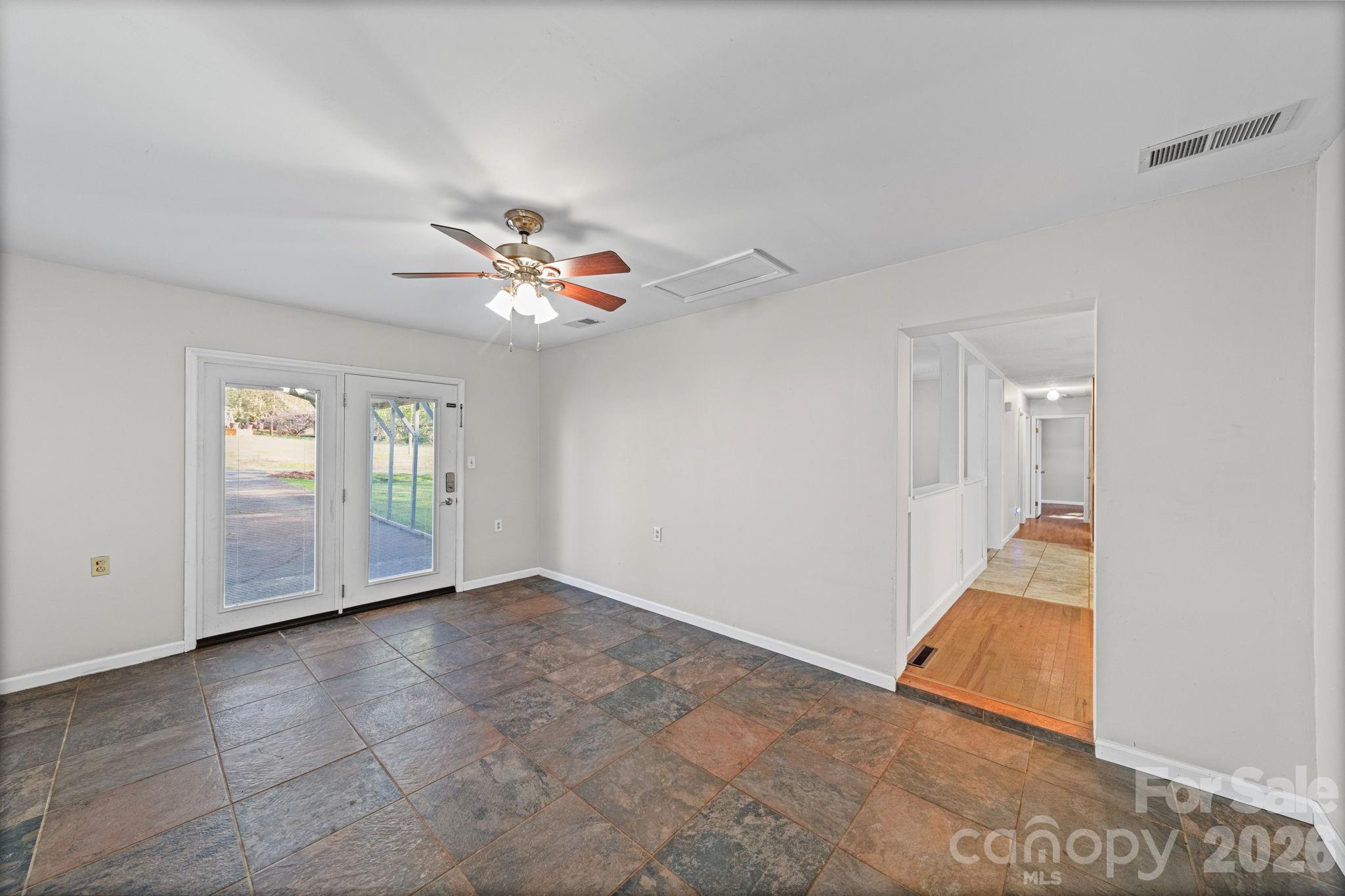 3227 Westover Road Statesville, NC 28677 - Photo 11 of 37 a view of an empty room with a window