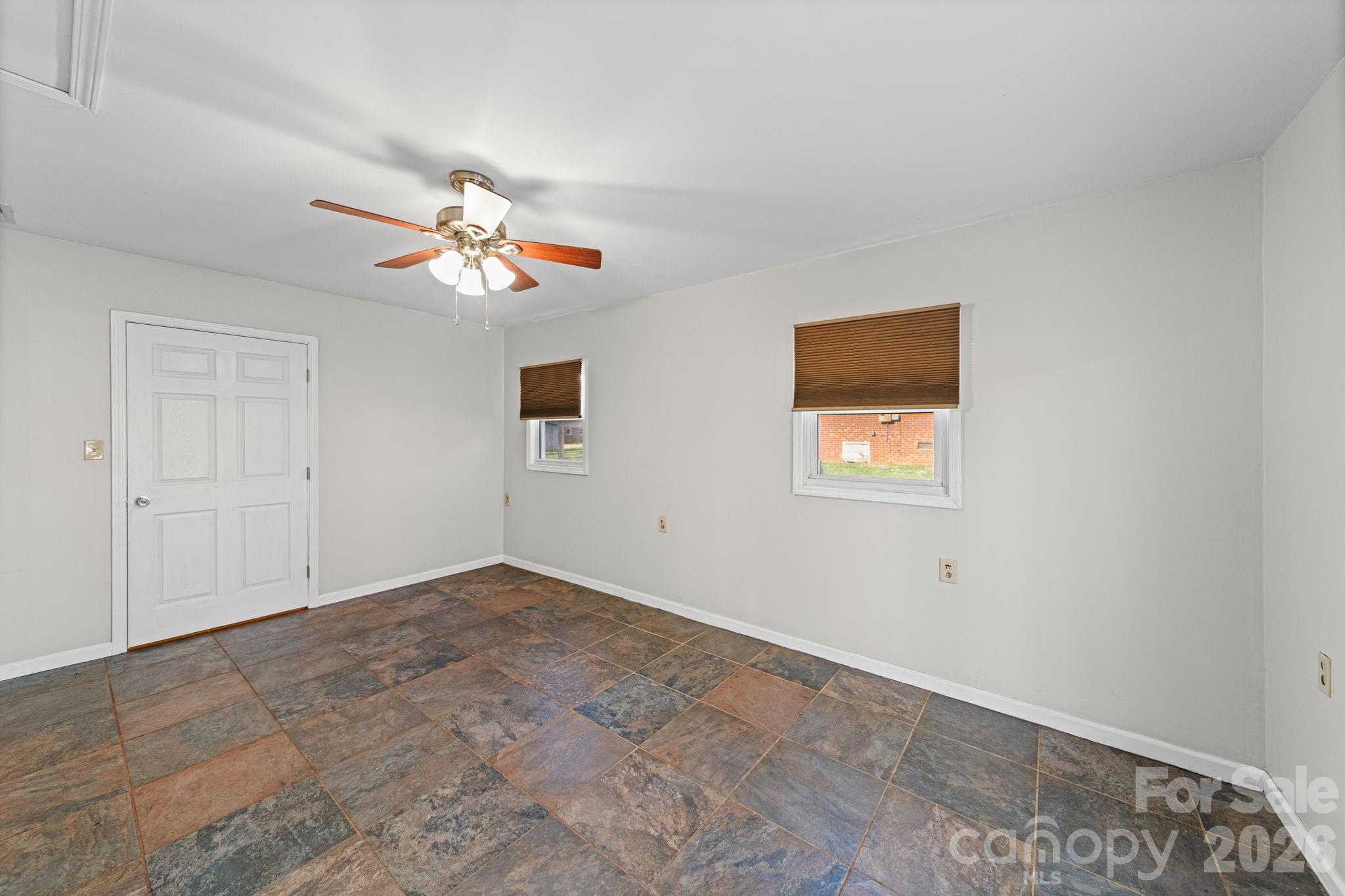 3227 Westover Road Statesville, NC 28677 - Photo 13 of 37 a view of a room with a fan