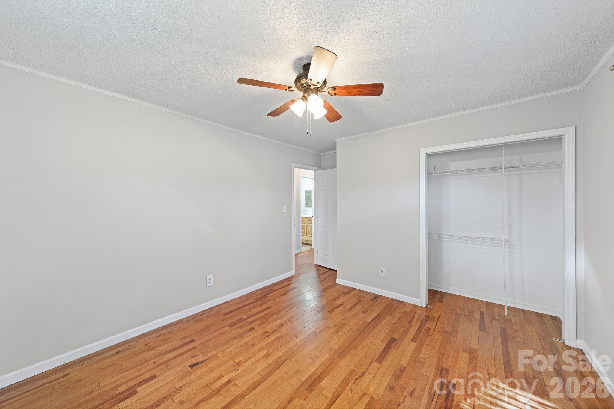 3227 Westover Road Statesville, NC 28677 - Photo 17 of 37 a view of empty room with wooden floor