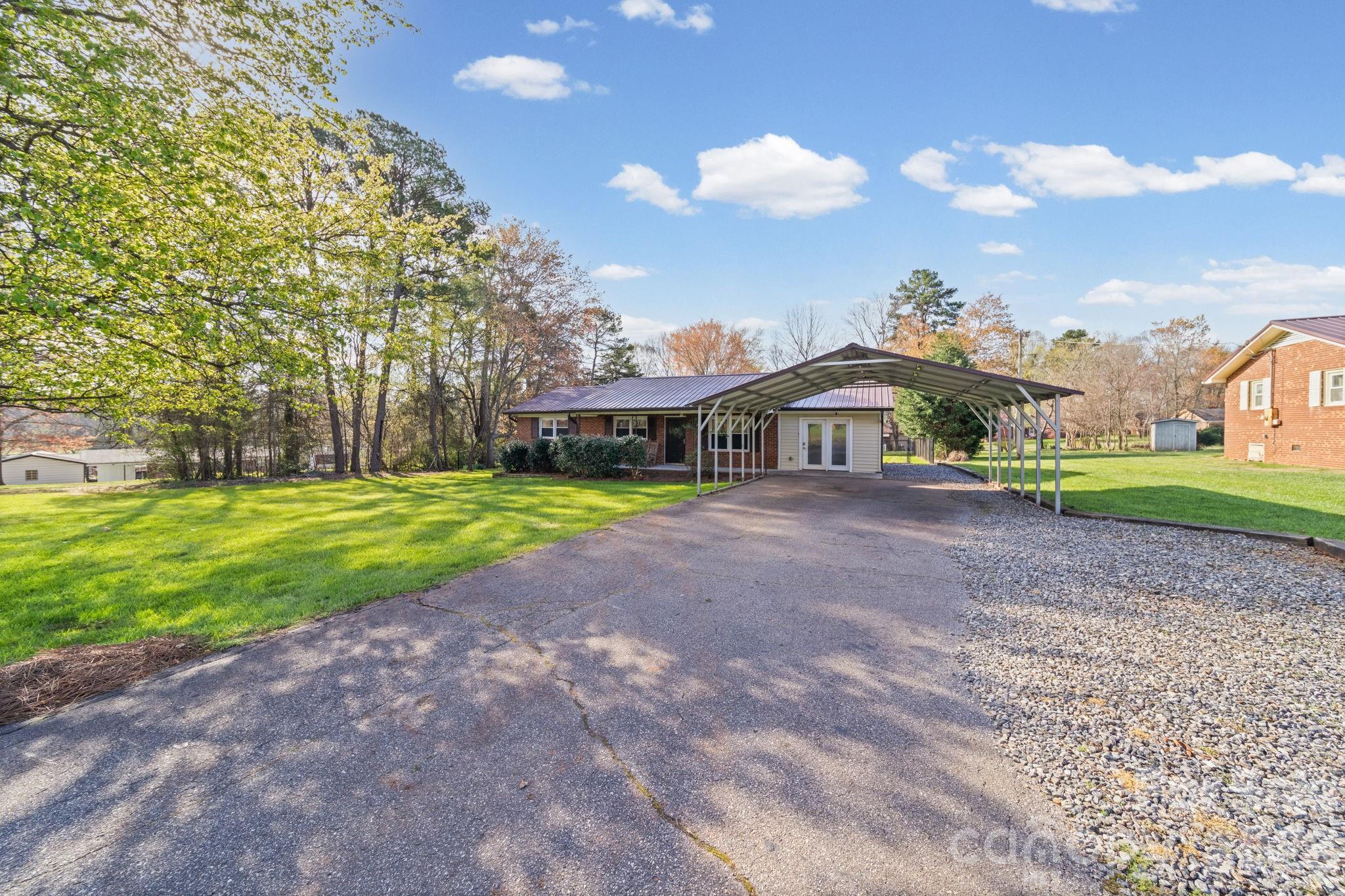 3227 Westover Road Statesville, NC 28677 - Photo 25 of 37 a view of a house with a yard