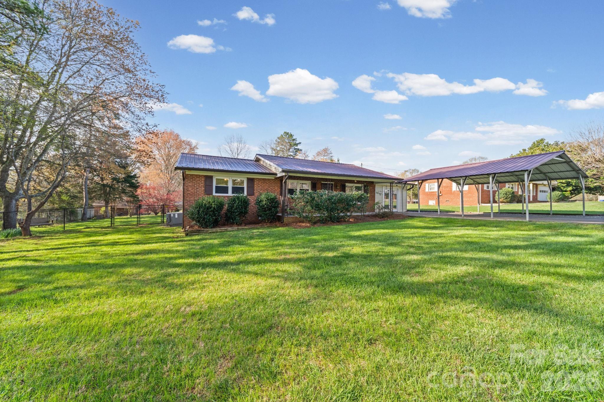 3227 Westover Road Statesville, NC 28677 - Photo 27 of 37 a front view of house with yard and green space