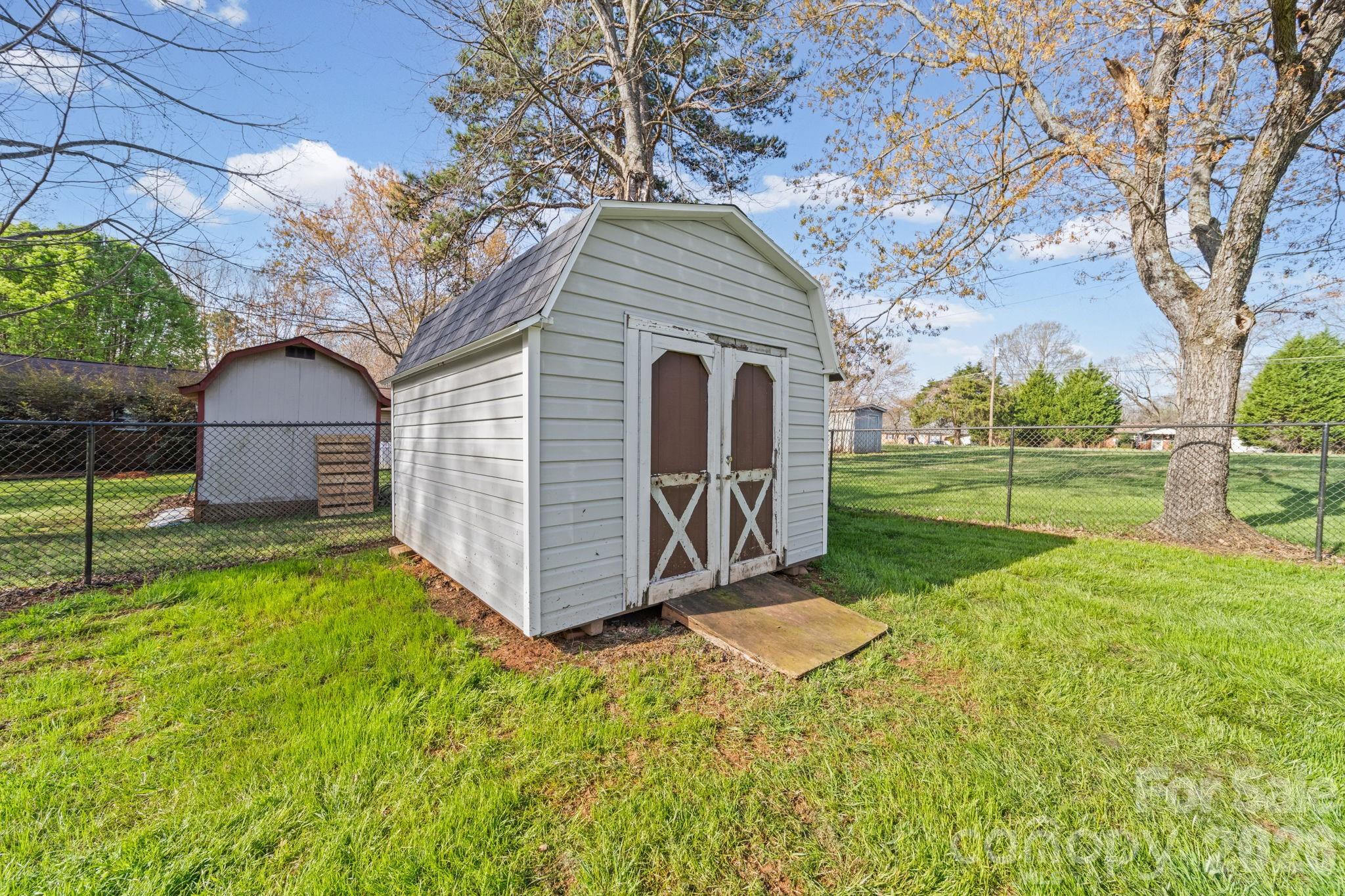 3227 Westover Road Statesville, NC 28677 - Photo 30 of 37 a view of backyard with a garden and trees