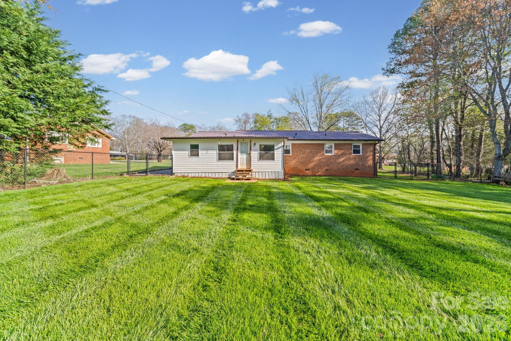 3227 Westover Road Statesville, NC 28677 - Photo 31 of 37 a view of a house with a big yard