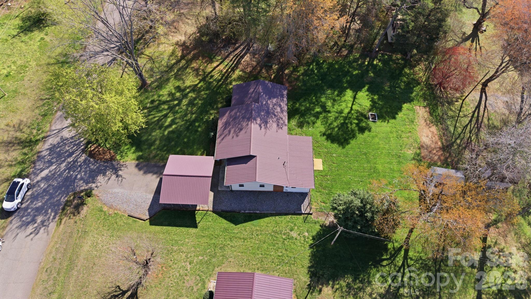 3227 Westover Road Statesville, NC 28677 - Photo 34 of 37 an aerial view of a house with a yard
