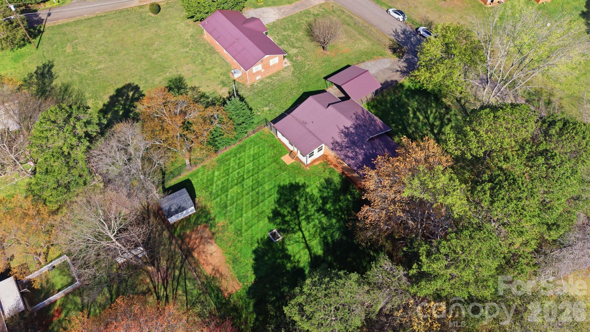 3227 Westover Road Statesville, NC 28677 - Photo 36 of 37 an aerial view of a house with a yard