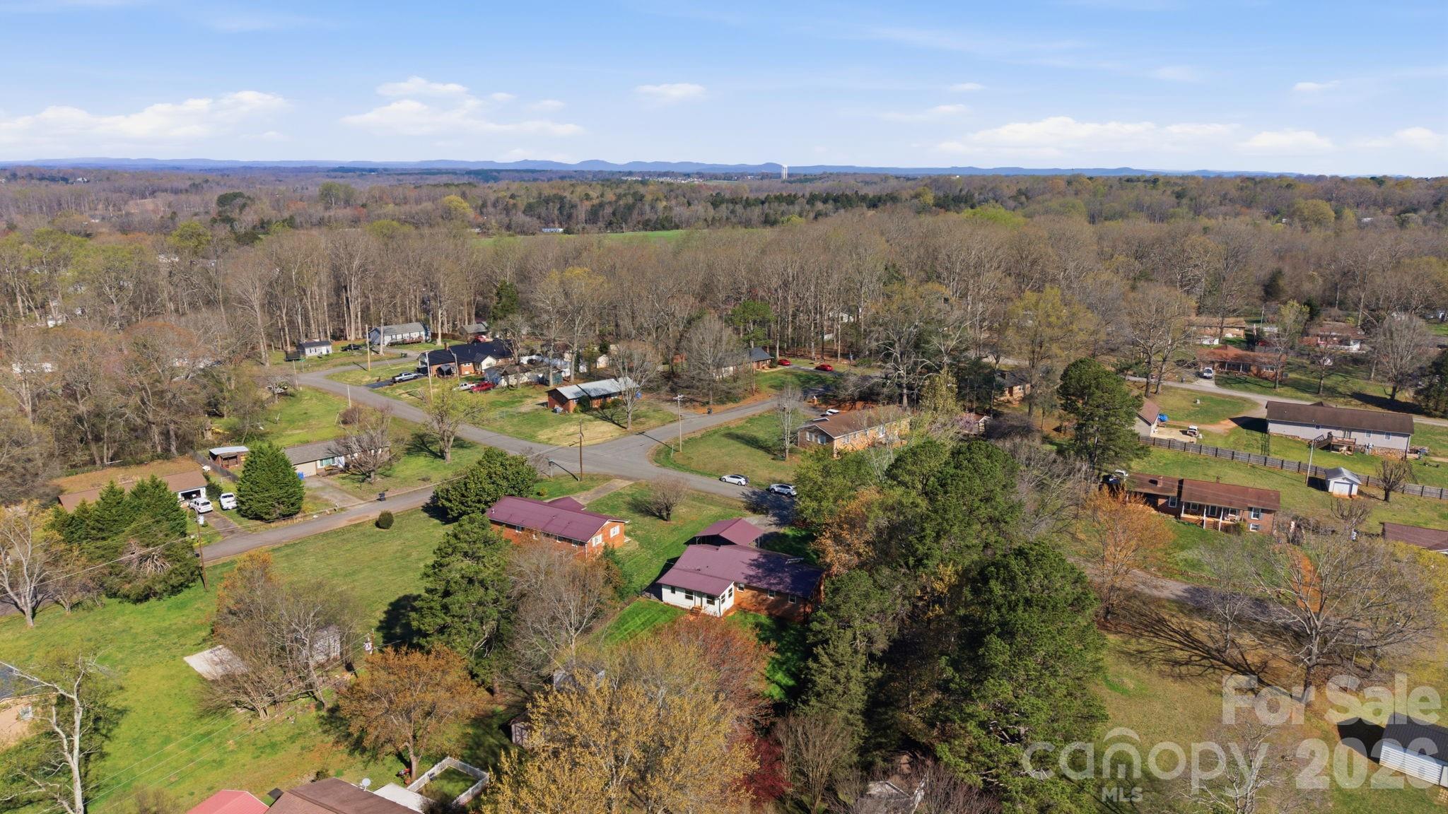 3227 Westover Road Statesville, NC 28677 - Photo 37 of 37 a view of a lake with mountains in the background