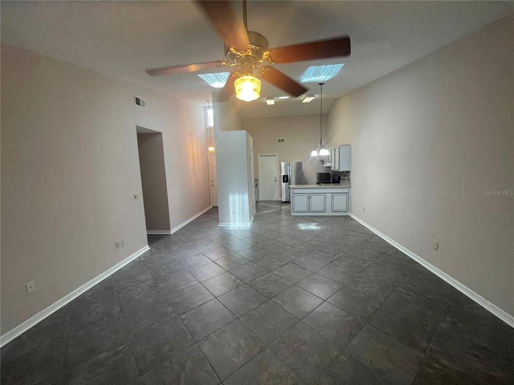 324 Northwest 48th Boulevard, Unit K Gainesville, FL 32607 - Photo 6 of 16 a view of a kitchen and a window