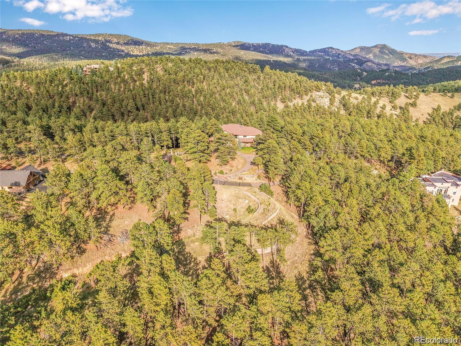 2317 Wieler Road Evergreen, CO 80439 - Photo 19 of 26 a view of an outdoor space and a mountain view