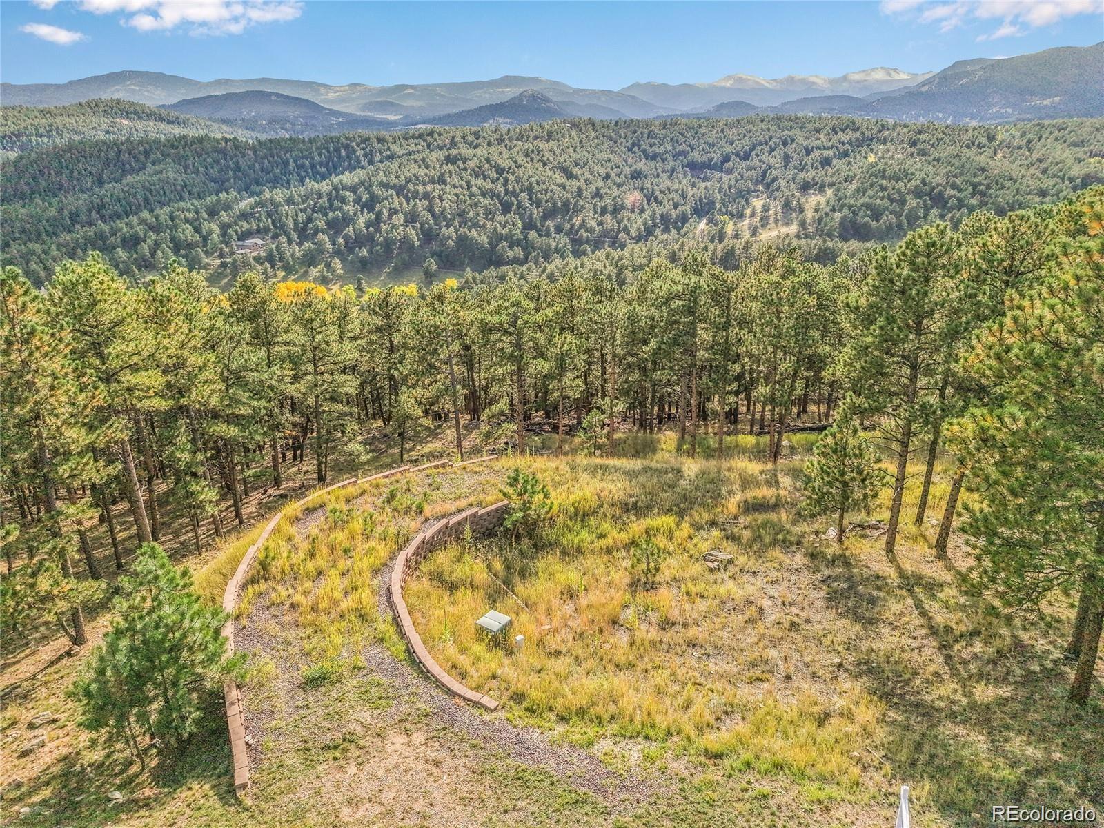 2317 Wieler Road Evergreen, CO 80439 - Photo 2 of 26 a view of lake view and mountain