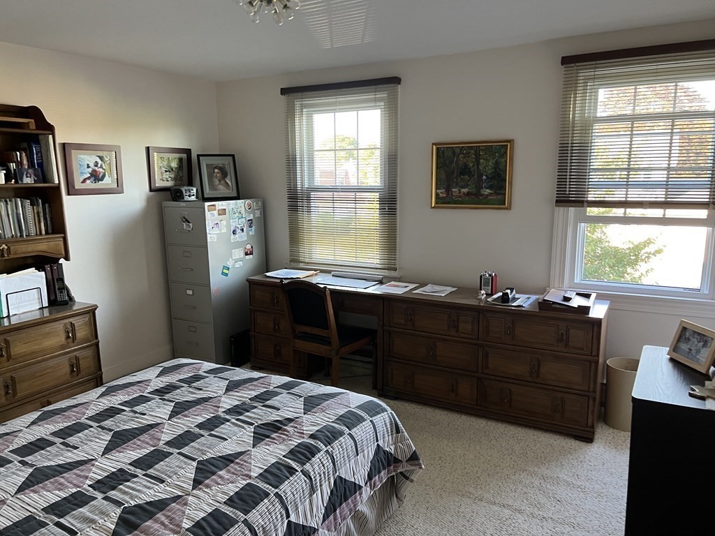 15 Leo Road Marblehead, MA 01945 - Photo 12 of 21 a bedroom with a bed and a window