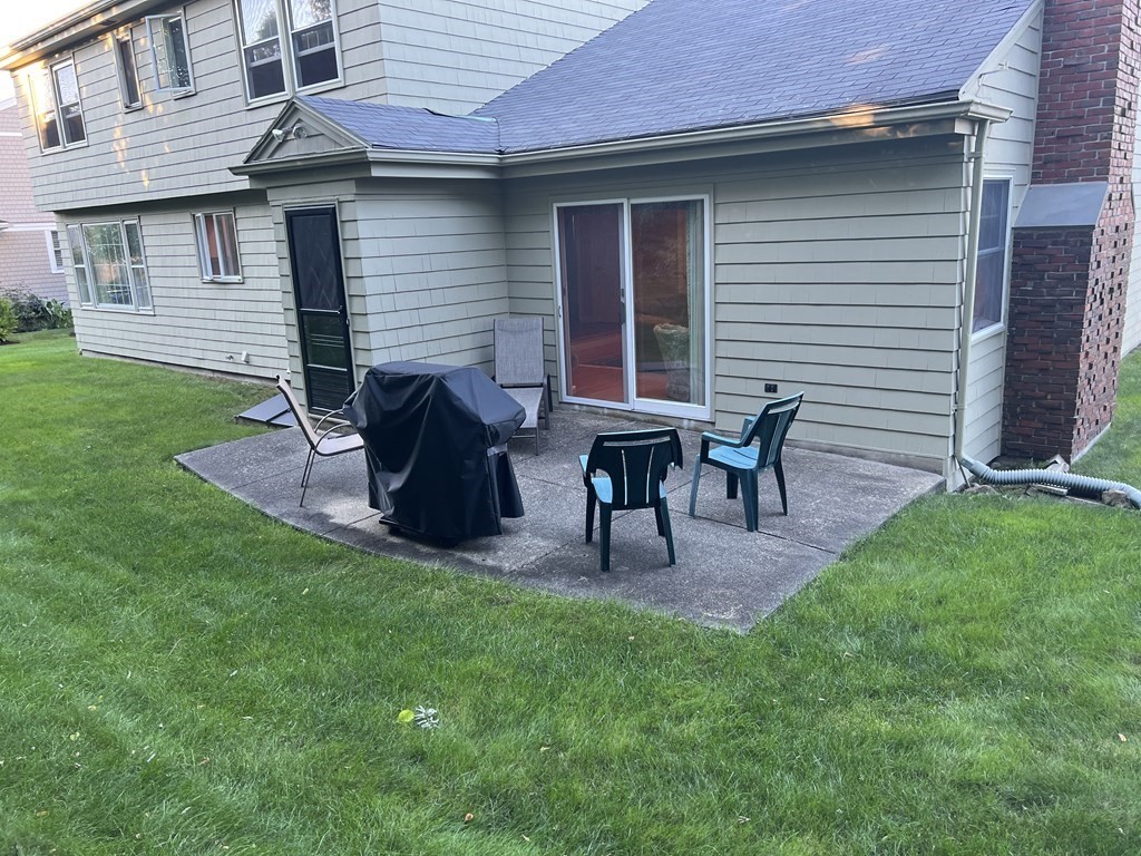 15 Leo Road Marblehead, MA 01945 - Photo 4 of 21 a house view with a seating space and garden