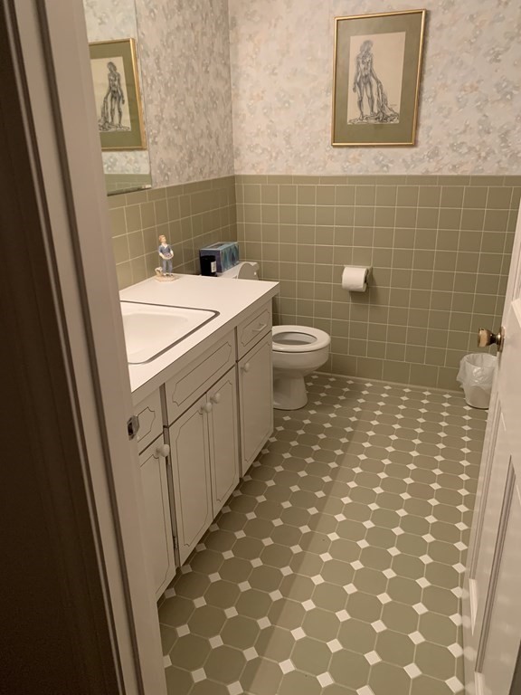 15 Leo Road Marblehead, MA 01945 - Photo 8 of 21 a bathroom with a sink and a mirror